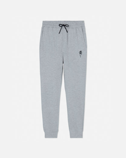 Gray sweatpants with a small black logo on a white background#color_space-dye-gray