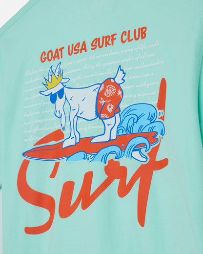 Mint t-shirt with a goat surfing design and 'GOAT USA SURF CLUB' text.