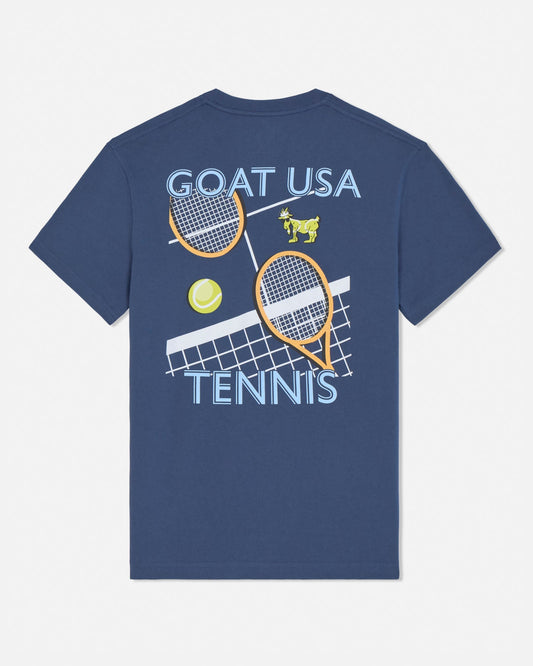 Navy blue t-shirt with tennis-themed graphic and 'GOAT USA Tennis' text on a light gray background