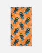 Patterned fabric with blue cartoon characters on an orange background