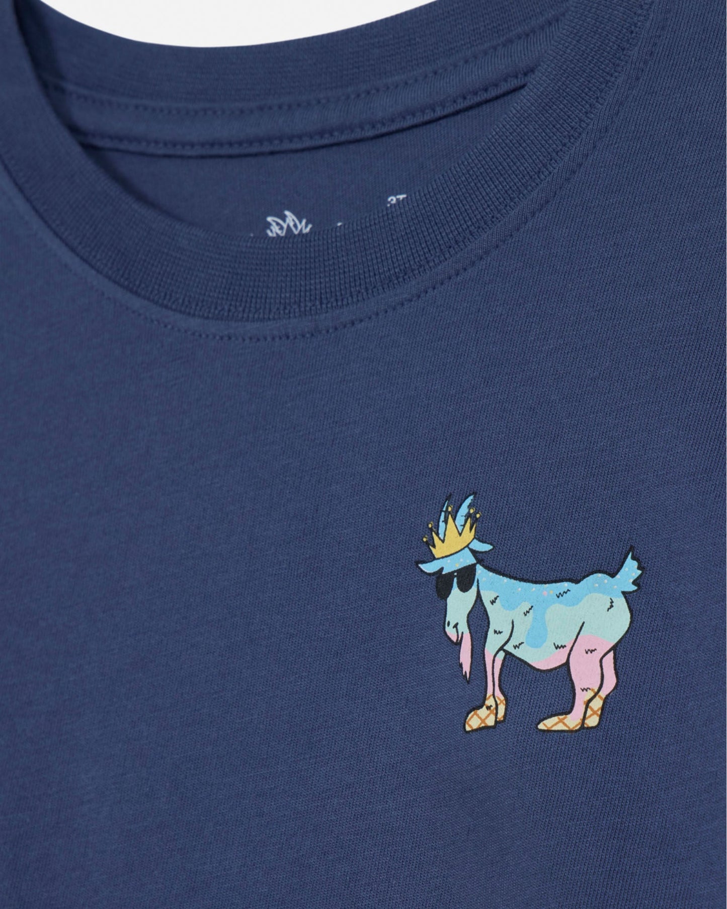 Navy blue t-shirt with a colorful goat graphic on a plain background