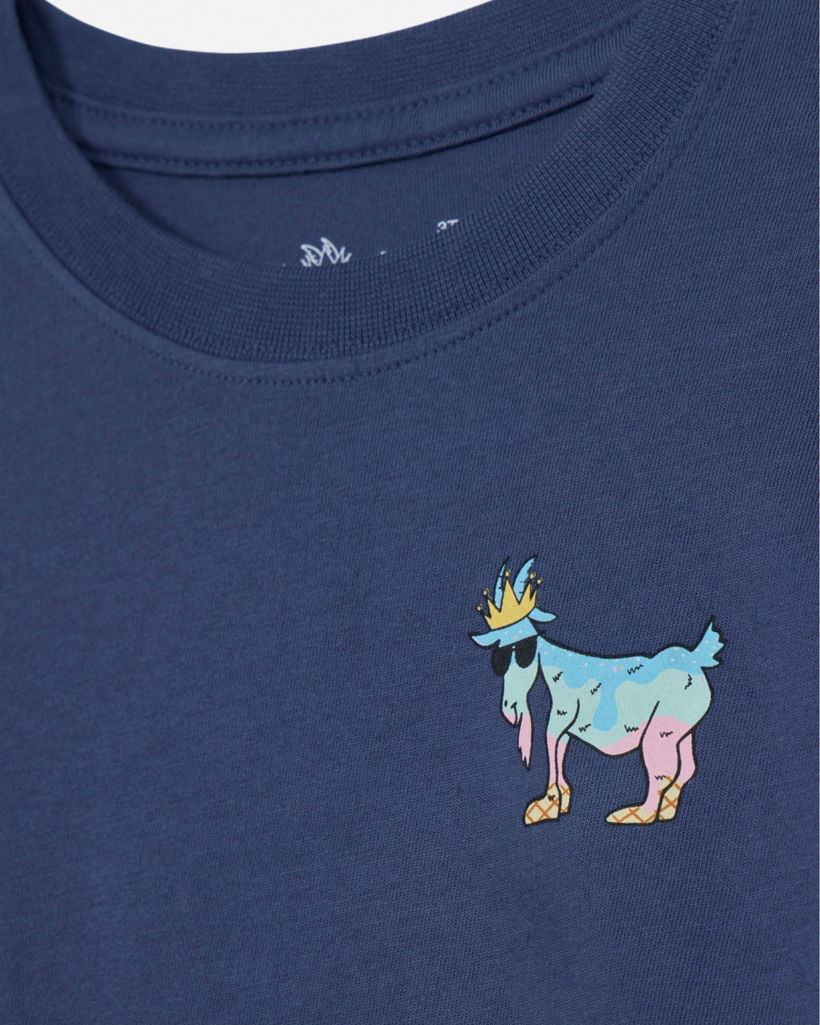 Navy blue t-shirt with a colorful goat graphic on a plain background