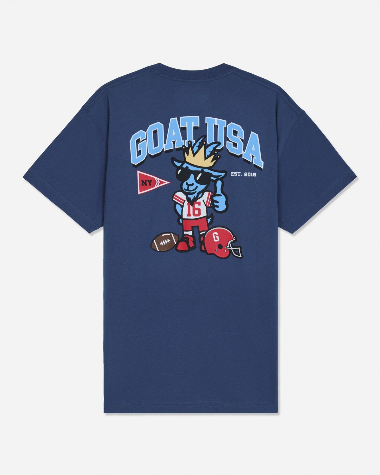 A navy blue short-sleeve t-shirt with a large graphic on the back. The graphic features the text 'GOAT USA' in light blue, a cartoon goat mascot wearing a gold crown and sunglasses, a red football helmet, and a red and white pennant.