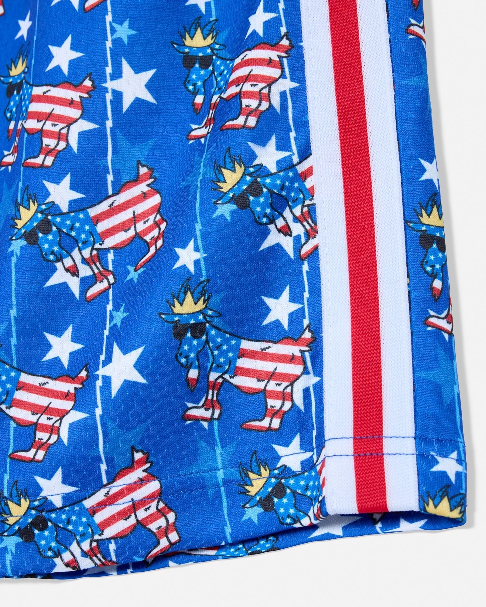 Shorts with American flag design featuring goats and stars on a blue background.