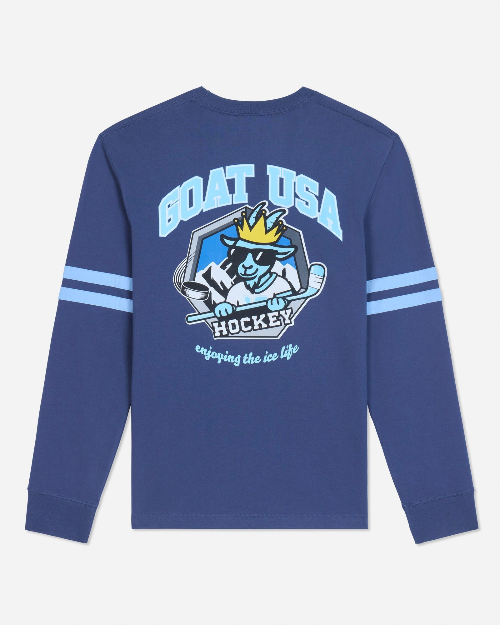 A royal blue long-sleeve t-shirt with a large graphic on the back featuring a cartoon goat hockey player and the text 'GOAT USA HOCKEY'. The sleeves have two light blue stripes, and the shirt is shown against a light gray background.