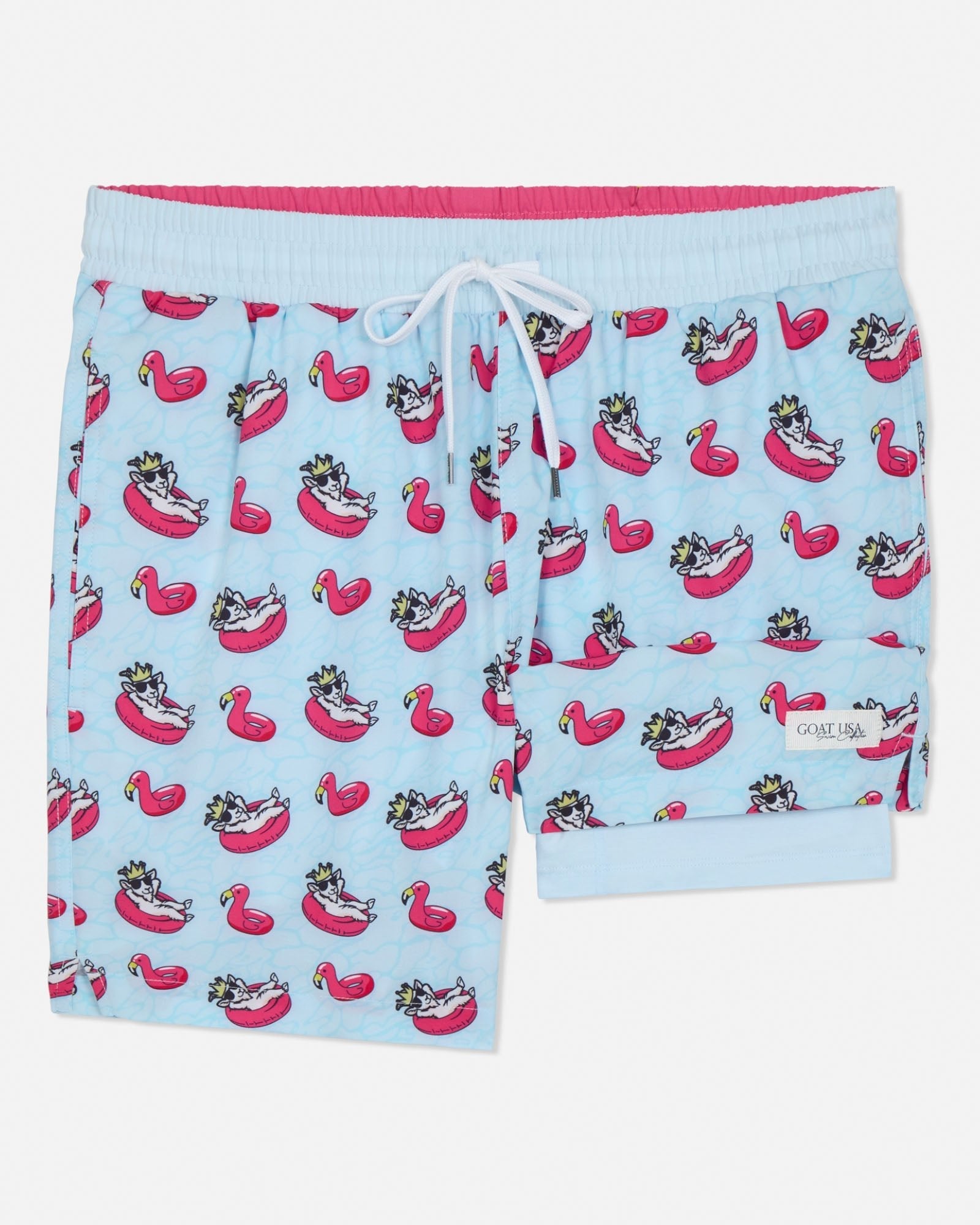 Light blue shorts with pink flamingo pool float and goat pattern on a white background