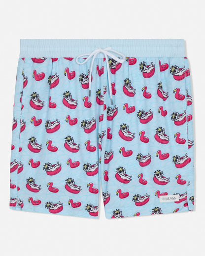 Swim shorts with goat and flamingo pool float pattern on a light blue background