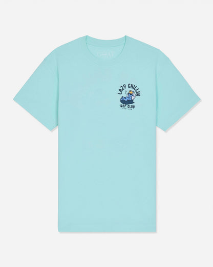 Front of mint t-shirt with goat laying in bed left-chest graphic