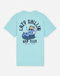 Back of mint t-shirt with goat laying in bed graphic and text that reads 'LAZY CHILLIN GOAT USA NAP CLUB'