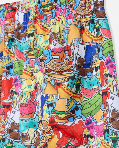 Colorful patterned fabric with various designs on a white background