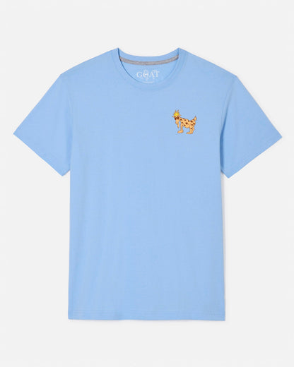 A light blue short-sleeve crewneck t-shirt with a small embroidered brown goat on the left chest, displayed on a clean off-white background.