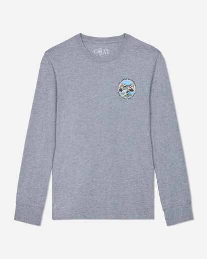 Gray long-sleeve shirt with a circular logo on a light gray background