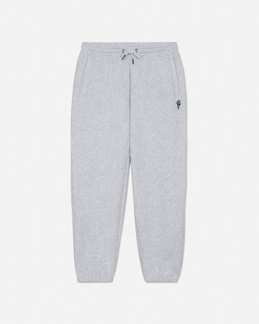 Gray sweatpants with a small logo on a light gray background#color_pale-gray