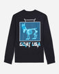 Black long-sleeve shirt with 'GOAT USA' graphic design on a light gray background