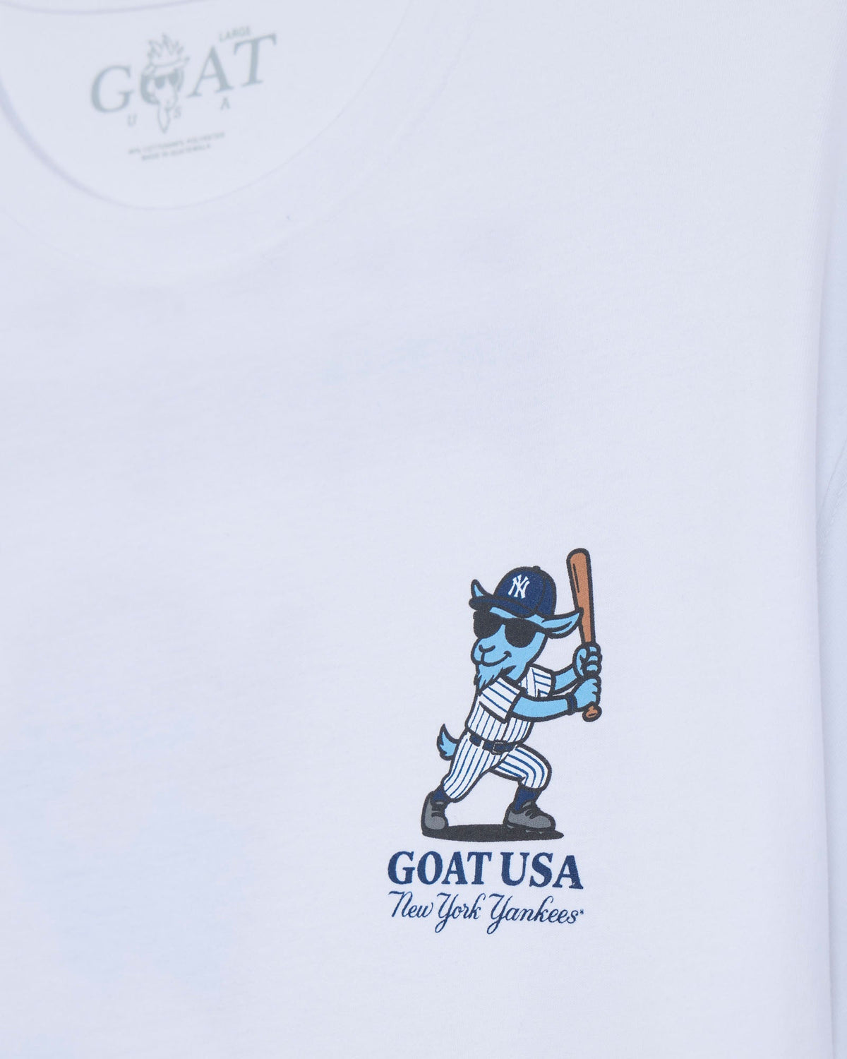 White short-sleeve t-shirt featuring a blue cartoon goat baseball player holding a bat, with 'GOAT USA New York Yankees' printed below.#color_white
