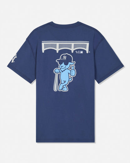A navy blue short-sleeve t-shirt shown from the back, featuring a large graphic of a light blue cartoon goat wearing a New York Yankees cap and holding a bat, with a white bridge graphic above.